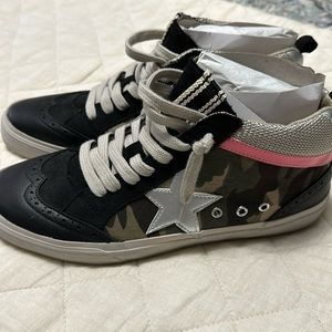 Never been worn size 8.5 mid sneakers
